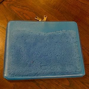 COACH clutch in blue genuine leather.